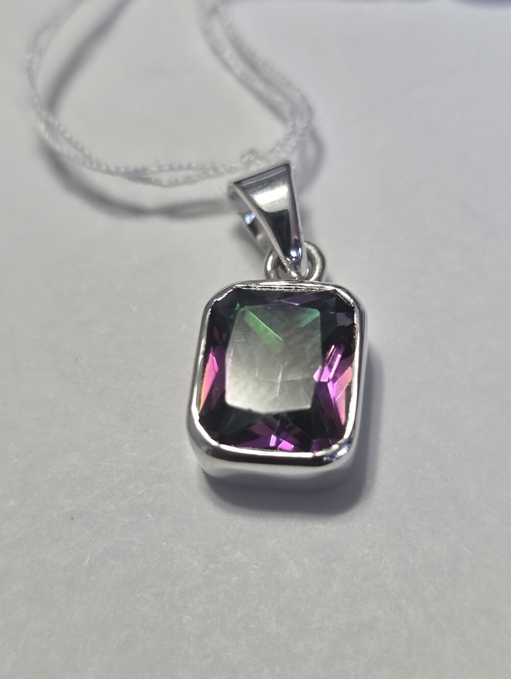 Silver Pendant with Iridescent Faceted Mystic Quartz Gemstone.
